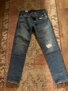 Vintage Levi's Women's Tapered 501 Blue Distressed Jeans -26